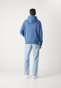 Calvin Klein Jeans SEASONAL MONOLOGO REGULAR HOODIE - Ikdienas džemperis - blue coast