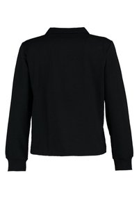Chemise noire à manches longues avec col, poignets côtelés et ourlet droit, vue de dos sur un fond blanc.