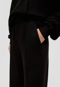 QS BROEK - Trainingsbroek - schwarz