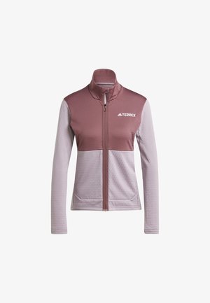 Lekka kurtka zapinana na zamek, z górną częścią w kolorze cynamonowym i dolną w jasnoszarym. Gładka faktura, boczne kieszenie, logo na klatce piersiowej.