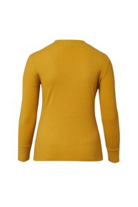 Geripptes Langarmshirt in Senfgelb mit rundem Ausschnitt und figurbetonter Passform. Verfügt über eine weiche Textur und ein schlichtes Design.