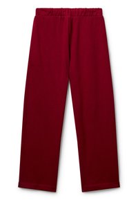 Vínové kalhoty s elastickým pasem a rovnými nohavicemi vyrobené z měkké látky, vystavené na bílém pozadí.