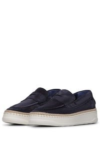 Granatowe zamszowe buty typu slip-on z plecioną śródstopą z juty, białą gumową podeszwą i haftowanymi detalami na czubku.