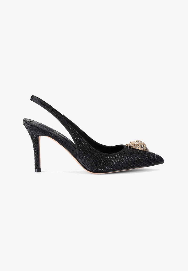Black slingback high-heeled shoe with pointed toe, embellished with a decorative gold eye motif and textured rhinestone surface.