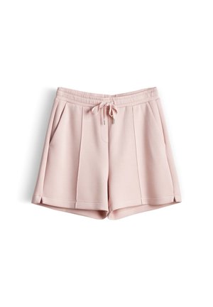 Shorts décontractés rose clair avec taille élastique, cordon à l'avant, poches latérales et panneaux avant cousus, posés à plat sur fond blanc.