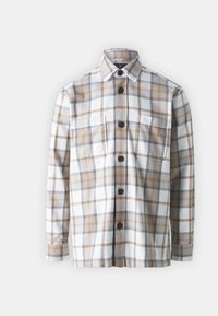 Button-up rutete skjorte i hvit, brun og grå. Laget av lett stoff med to frontlommer og krage.