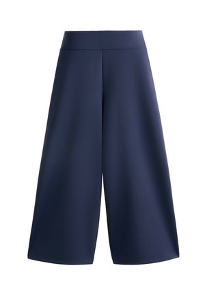 Námornícke culottes s širokým strihom, vyrobené z hladkej tkaniny. Majú vysoký pás a čisté, rovné lemy. Bez vzorov alebo akcentov.