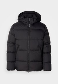 Veste matelassée noire avec capuche, dotée d'un design matelassé, fermeture éclair et poches latérales. Fabriquée en matériau léger et isolant.