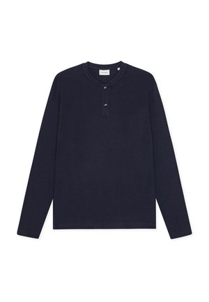 Marineblauwe longsleeve henley shirt gemaakt van textuurstof, met een ronde hals, knopenlijst en ribgebreide manchetten.