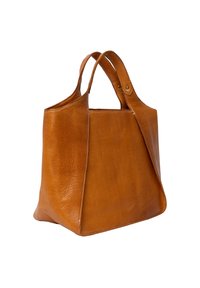 Grand sac fourre-tout en cuir marron avec double anses, présentant une forme structurée et des coutures visibles. Texture lisse avec un design minimaliste.