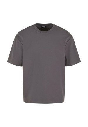 Šedé bavlněné tričko s krátkými rukávy, kulatým výstřihem a volným střihem. Hladká textura, minimalistický design, žádné vzory ani viditelné prvky.