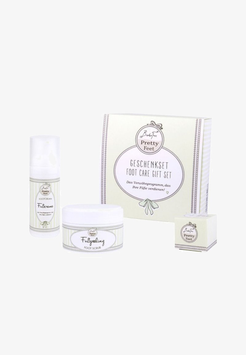 Foot care gift set with foot cream, foot scrub, small cream jar, and a decorative box labeled "Pretty Feet."