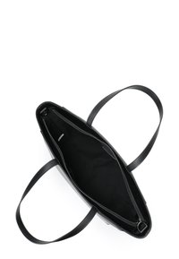 Black leather tote bag with a smooth texture, featuring two sturdy handles, a zippered compartment, and a spacious black fabric interior.