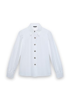 Blusa bianca a maniche lunghe con colletto a punta e sei bottoni decorativi argentati sul davanti, polsini leggermente arricciati.