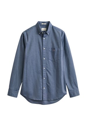 Hemd zum Zumknöpfen aus strukturiertem dunkelblauem Stoff, mit einer Tasche auf der linken Brust, spitzem Kragen und langen Ärmeln mit geknöpften Manschetten.