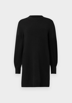 Vestido negro de punto con escote redondo, mangas largas abombadas y puños acanalados. Silueta simple y recta. Textura suave.