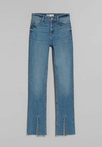 Helle blaue Jeans aus Denim mit einem hochgeschnittenen Design, geraden Beinen und sichtbaren seitlichen Schlitzen am Knöchel. Klassische Fünf-Taschen-Optik.