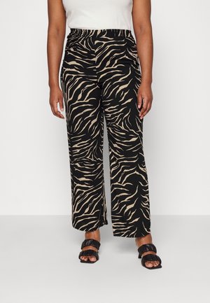 Zwarte wijde broek met een zebraprint patroon in beige. Gemaakt van lichtgewicht stof, met een elastische tailleband voor comfort.