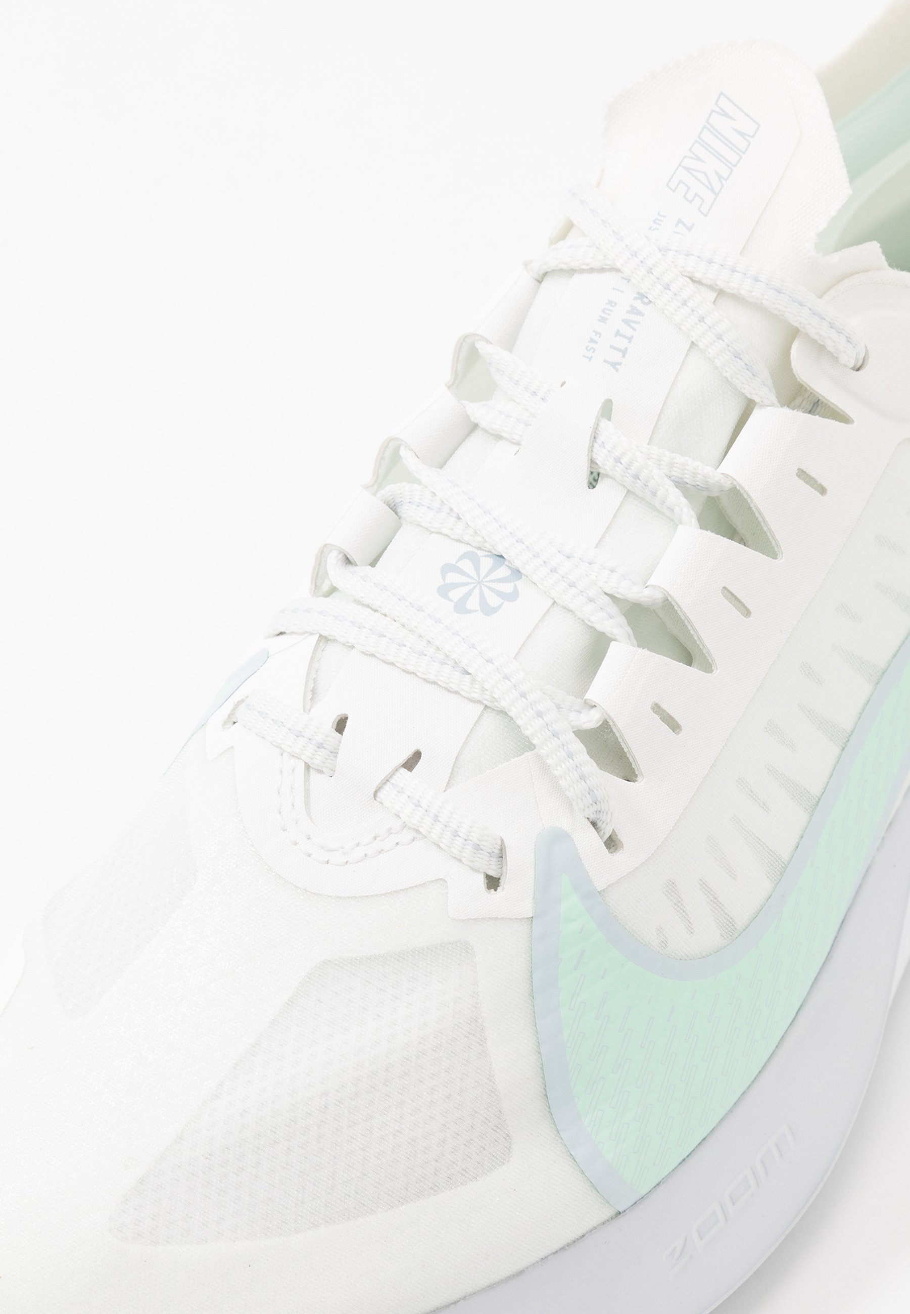 nike running zoom gravity trainers in white