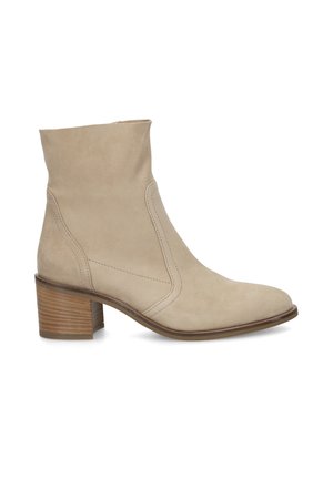 Beige suede ankle boot with a stacked wooden block heel, rounded toe, and side zipper closure, shown in profile facing left.