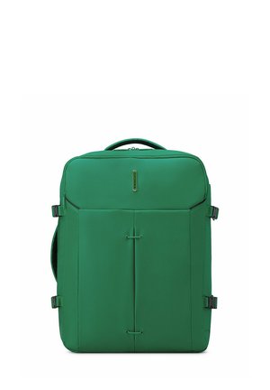 Green rectangular soft suitcase with side buckles, front seams, top handle, and a small vertical logo plate in the center.
