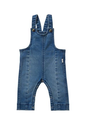 Salopette en denim bleue avec des bretelles ajustables, des boutons en métal et des fermetures à pression en bas. Tissu texturé avec des détails de couture visibles.