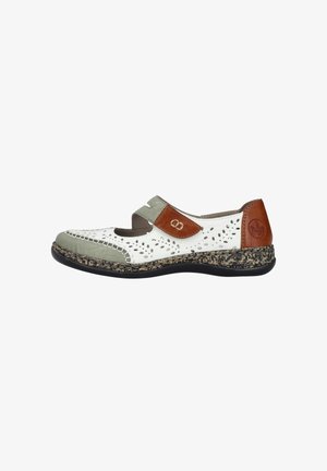 White leather shoe with green accents, perforated design, and brown leather strap. Detailed stitching on the toe and a cork-like sole.