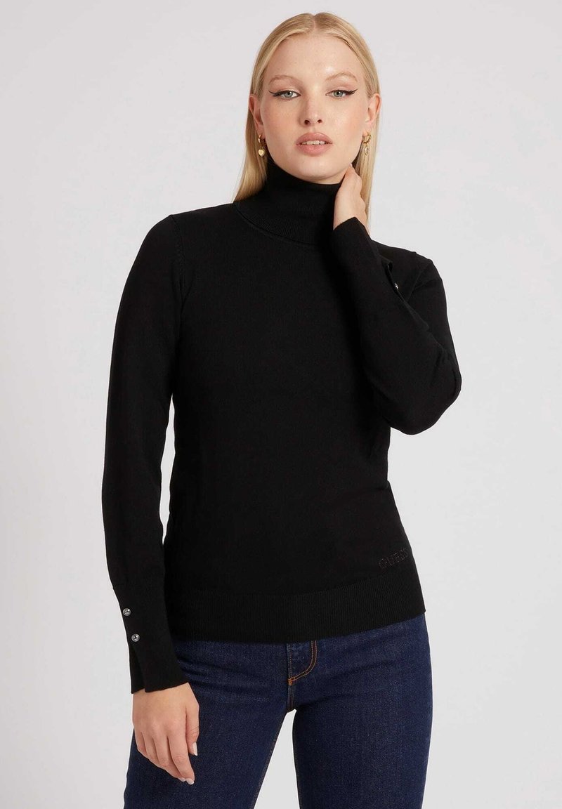Maglione nero a collo alto con maniche lunghe, polsini a coste con bottoni decorativi e una texture liscia. Logo del marchio discreto sull'orlo.