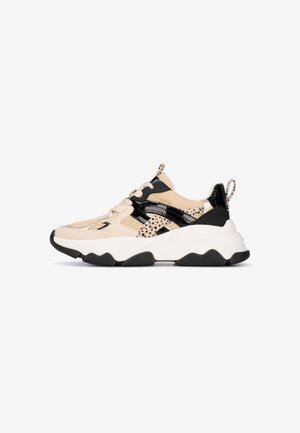 Beige and black sneakers featuring a mesh upper, suede accents, leopard print detail, and a chunky white sole with textured black outsole.