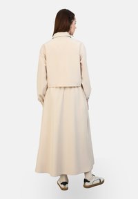 Modanisa BENIN SET - Veste légère - beige