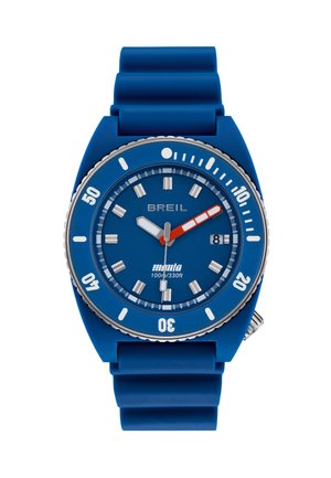 Montre à bracelet en silicone bleu avec un cadran bleu, une lunette argentée, des index blancs et une aiguille des secondes orange. Résistante à l'eau jusqu'à 100 m.