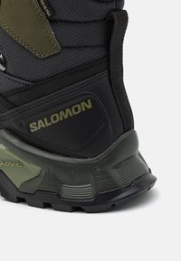 Salomon QUEST ELEMENT GORE TEX - Hiking shoes - black/deep lichen green/olive night