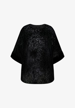 Top noir transparent avec motif floral brodé, manches larges, encolure ronde et tissu texturé. Design léger et ample.