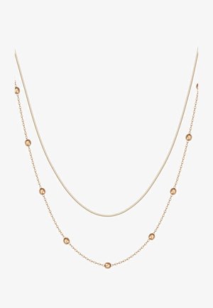 Goldfarbene, mehrlagige Halskette mit einer glatten Kette und sphärischen Perlen entlang des unteren Strangs. Elegantes und minimalistisches Design.