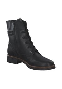 Stivale alla caviglia in pelle nera con punta arrotondata, lacci decorativi, zip laterale e suola texture. Presenta un piccolo tacco impilato.