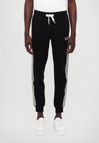 EA7 Emporio Armani PANTALONI - Treniņtērpa apakšdaļas - black