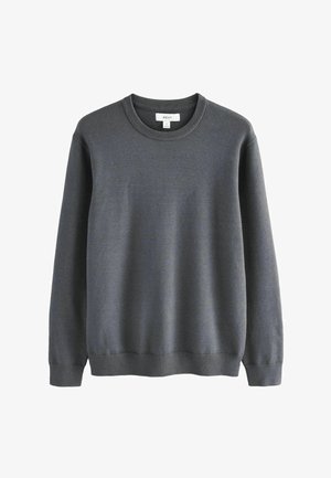 Szürke pulóver, puha anyagból készült, kerek nyakkivágással, hosszú ujjal, valamint bordás mandzsettával és aljjal a testhez álló megjelenés érdekében.