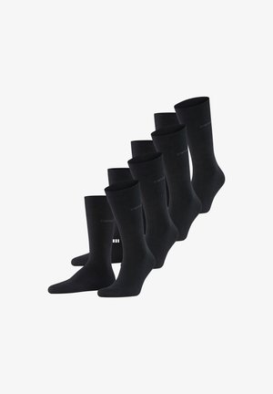 Schwarze Baumwollsocken, einfarbig, geripptes Muster, mittlere Schafthöhe, sechs Paare, dezentes Logo-Detail an der Seite. Robustes und bequemes Design.
