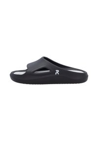 Black slide sandal made of flexible material, featuring an open design, cut-out accents, and a white insole with logo detail.