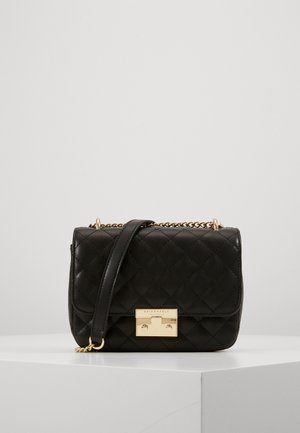 Black quilted leather handbag features a gold-tone clasp and chain strap, with a structured rectangular shape and smooth texture.