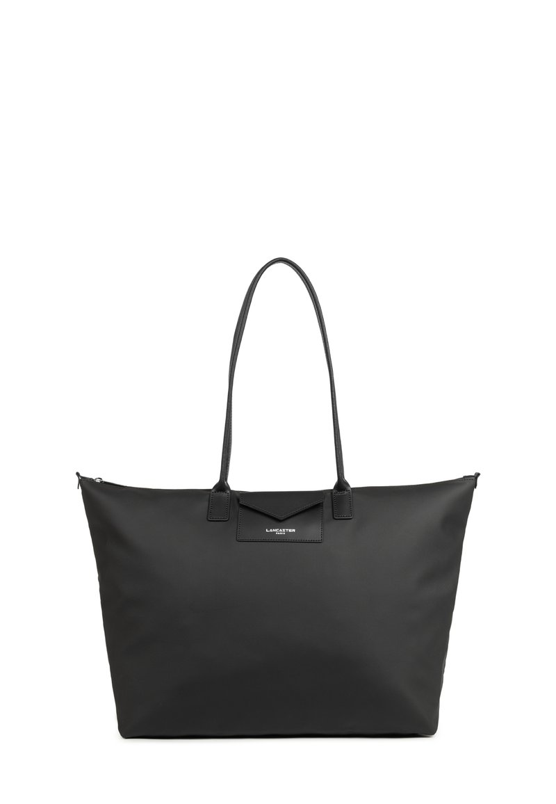 Borsa a tracolla nera realizzata in materiale sintetico liscio. Presenta manici lunghi, una chiusura con zip e un logo sul fronte. Forma rettangolare.