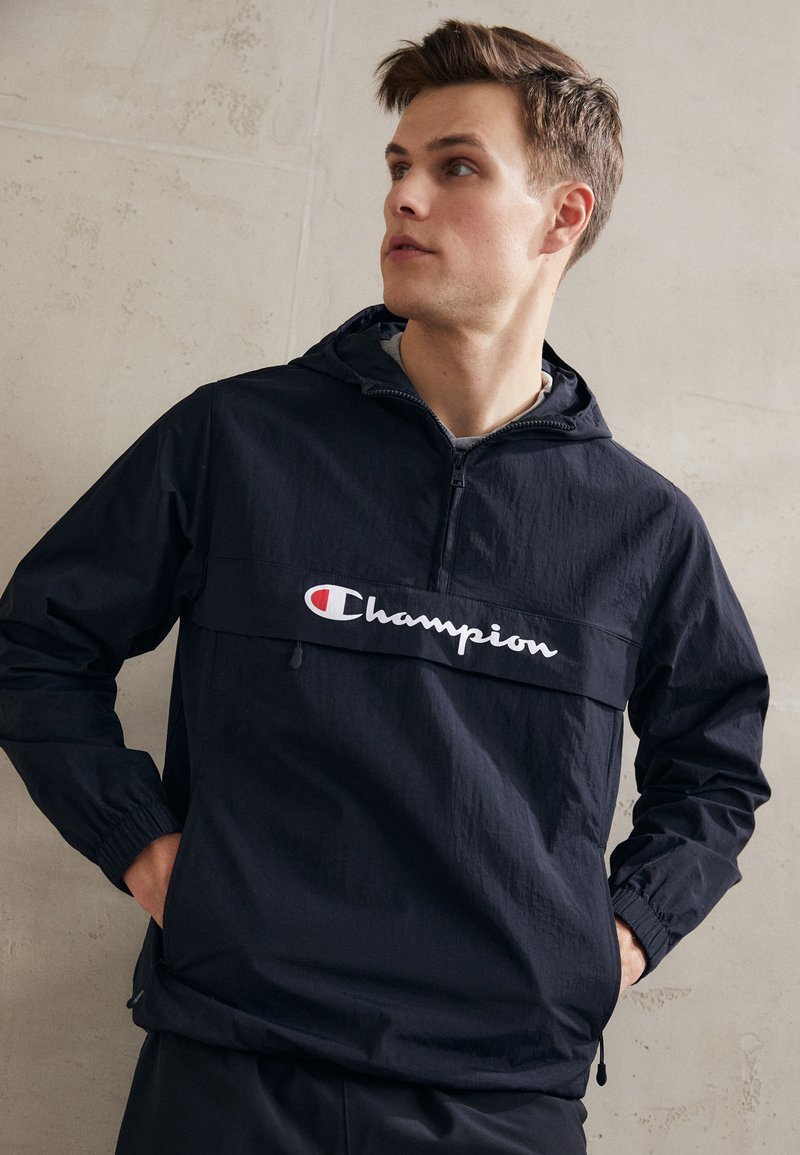 Champion - HALFZIP HOODED JACKET - Windbreakers - black, Forstør