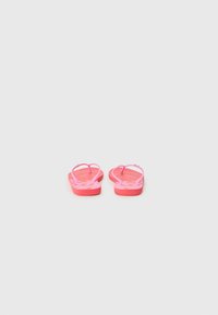Rosa flip-flops med blomsterdesign, gummistropper og strukturert fotbed. Har et flatt, thong-design som er egnet for uformell bruk.