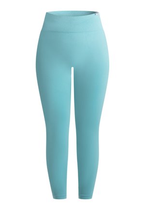 Turkusowe legginsy wykonane z elastycznego materiału, z szerokim prążkowanym paskiem w talii i gładkim, bezszwowym wykończeniem.