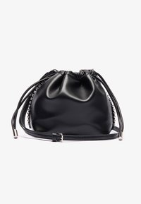 Black leather drawstring bag with a smooth texture. Features a detachable strap and decorative bead accents along the side.