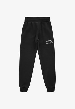Pantaloni da jogging neri con vita e polsini elastici, con la scritta bianca "ICEBERG MILANO ITALIA since 1974" sulla parte superiore della coscia sinistra.