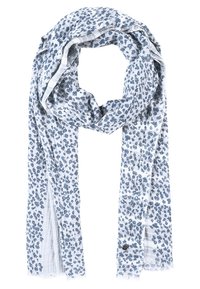 Écharpe blanche légère avec un petit imprimé floral bleu et des bords subtilement frangés, pliée librement avec les extrémités pendantes.