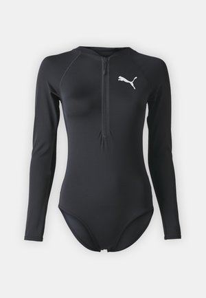 Black long-sleeve bodysuit made of smooth, stretchy material. Features a front zipper and a white logo on the chest. Form-fitting design.
