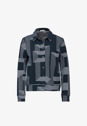 Chaqueta navy con un patrón de líneas geométricas en blanco, cierre de botones, color y puños y dobladillo acanalados. Hecha de un tejido texturizado.