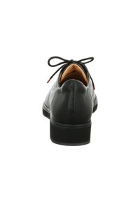 Schwarzer Lederschuh mit glatter Oberfläche, runder Spitze, Schnürverschluss und niedrigem Absatz. Innen mit beige Material ausgekleidet. Minimalistisches Design.